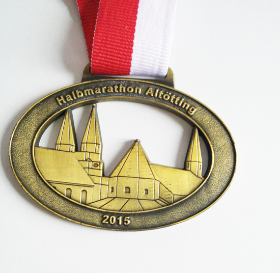 Engraved medal with bronze plated