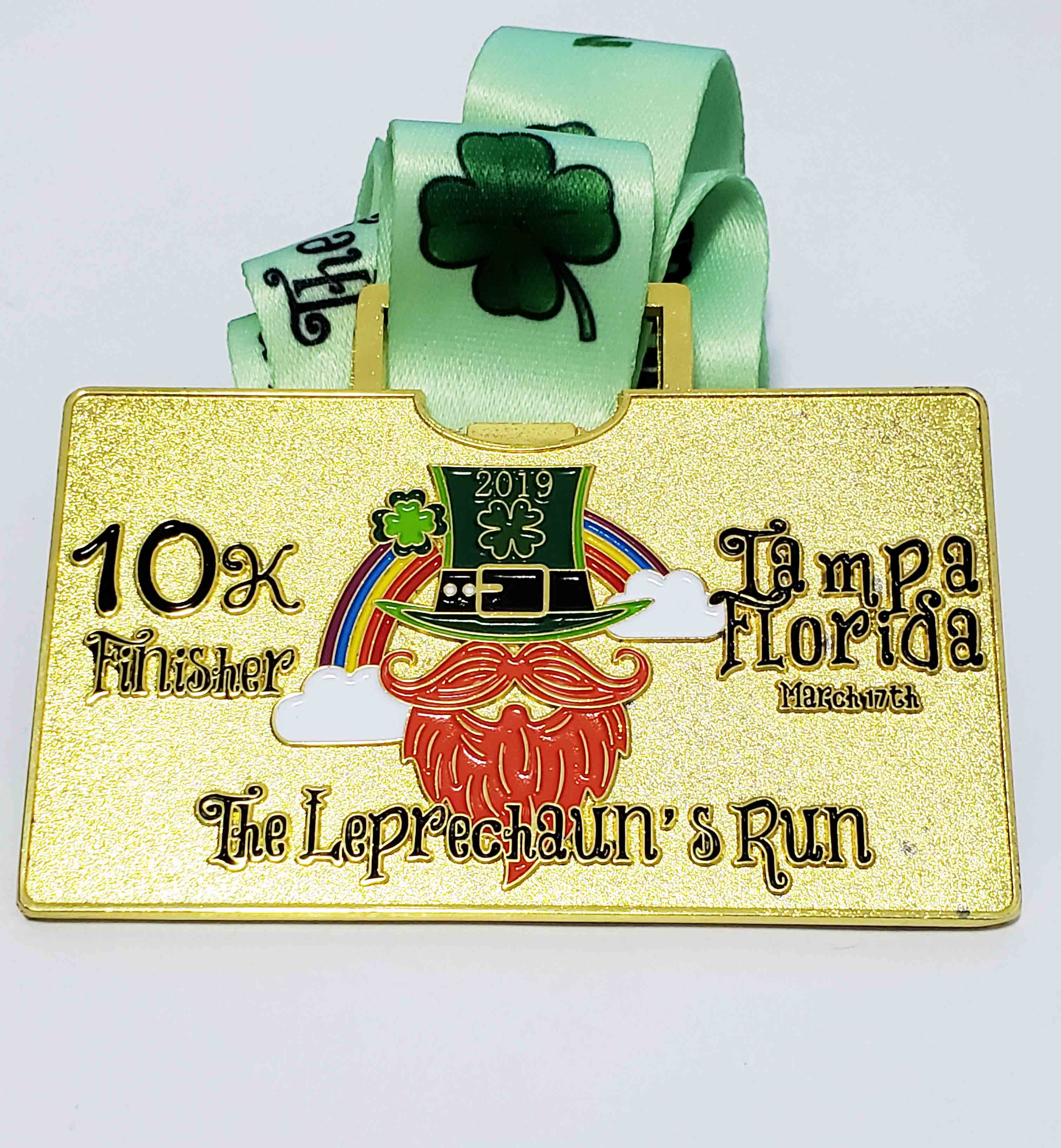 10K running medal with gold plating
