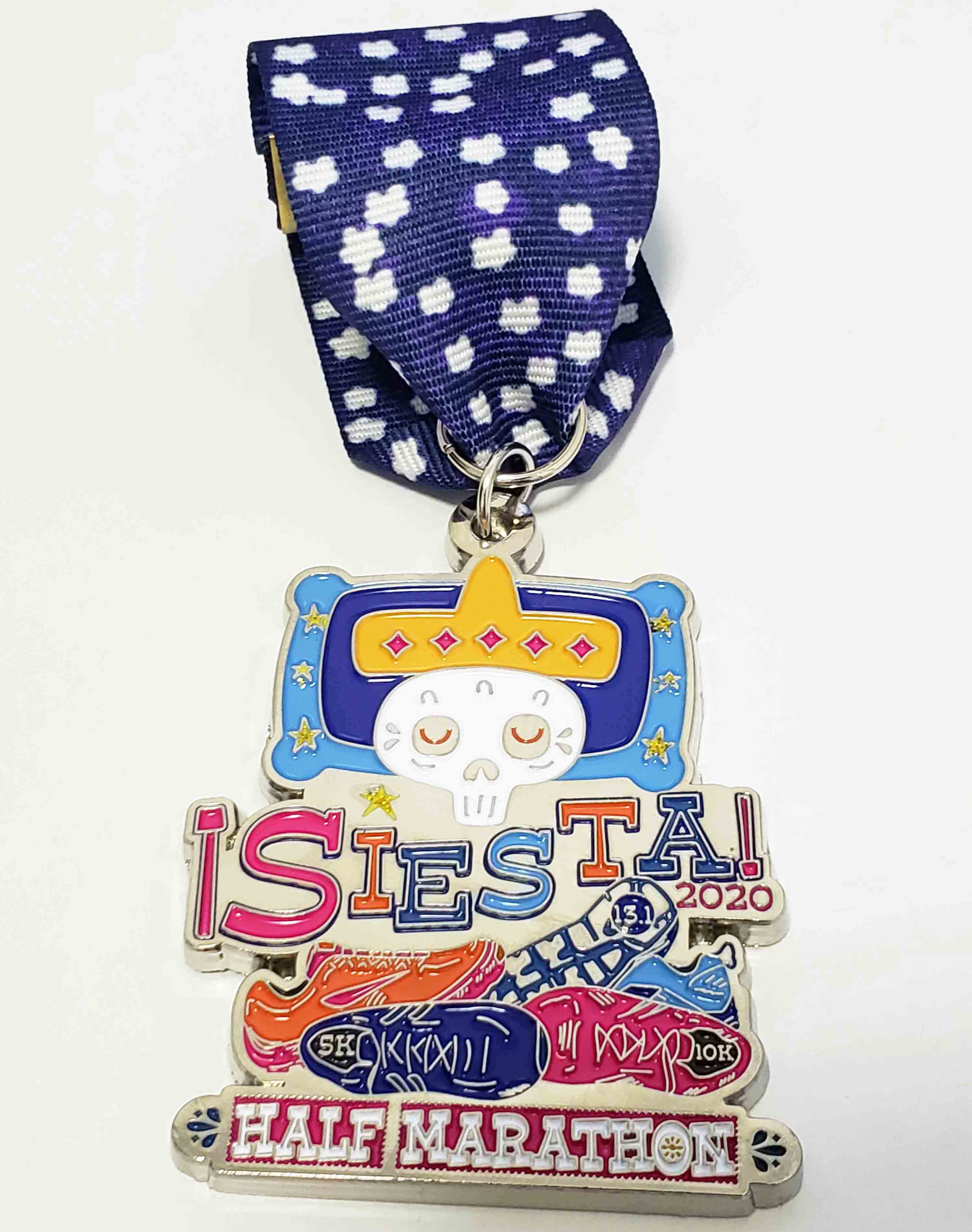 half marathon medal with glowing ribbon